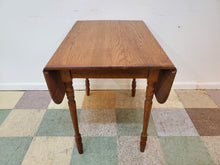 Load image into Gallery viewer, Antique Oak Drop Leaf Table With Turned Legs