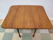 Load image into Gallery viewer, Antique Oak Drop Leaf Table With Turned Legs