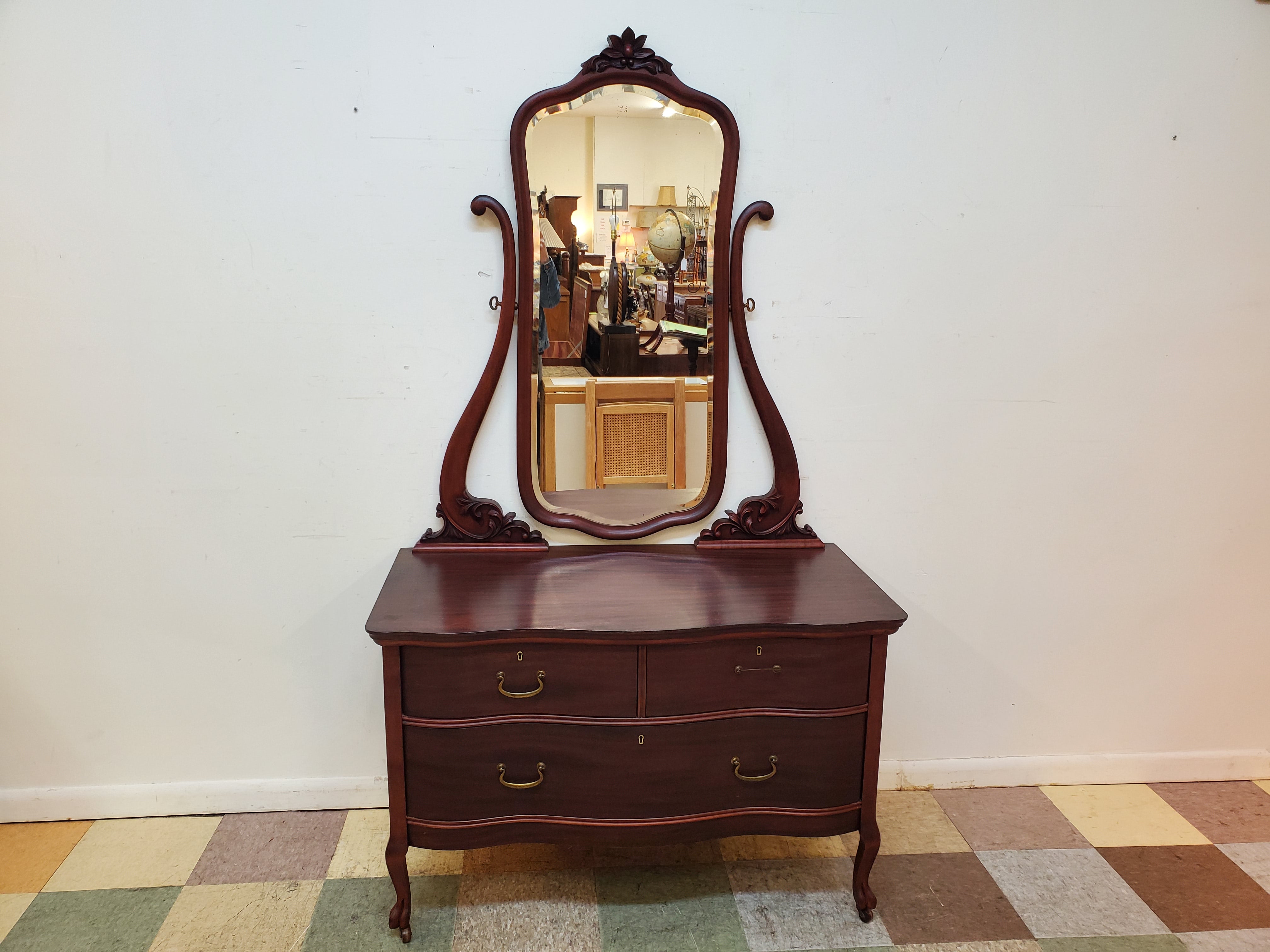 vintage mahogany dresser with mirror Late Victorian American Vanity & Glass Roller Feet Handcrafted Amish Dresser with 9 drawers and a beveled oval mirror Elements International Brunswick Mahogany Brown