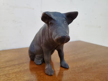 Load image into Gallery viewer, Vintage Black Cast Iron Pig Coin Bank
