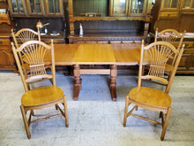 Load image into Gallery viewer, Vintage Oak Trestle Base Dining Table Set With 2 Hidden Leaves and 4 Comb Back Chairs By S Bent Bros
