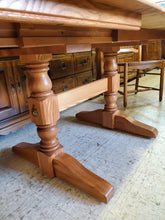 Load image into Gallery viewer, Vintage Oak Trestle Base Dining Table Set With 2 Hidden Leaves and 4 Comb Back Chairs By S Bent Bros

