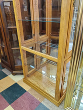 Load image into Gallery viewer, Vintage Oak Curio Display Cabinet With Beveled Glass and Lights By Creations Furniture
